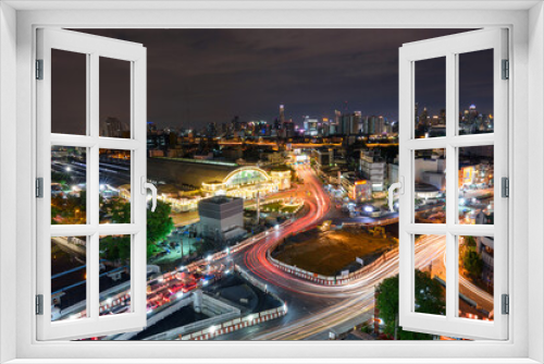 Fototapeta Naklejka Na Ścianę Okno 3D - high view of city and blur traffic light in night time