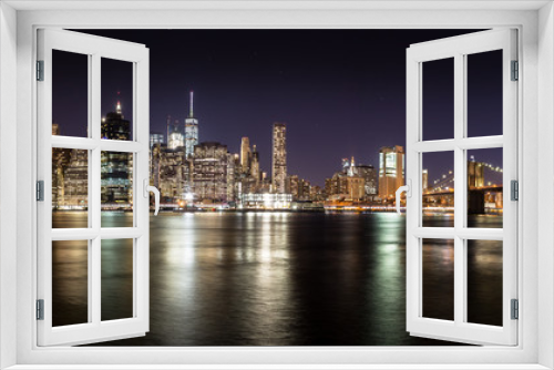 Fototapeta Naklejka Na Ścianę Okno 3D - New York skyline - vue de nuit sur Manhattan