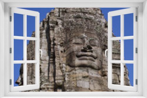 Fototapeta Naklejka Na Ścianę Okno 3D - Buddha Head Tower