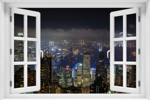 Fototapeta Naklejka Na Ścianę Okno 3D - Aerial night view from Victoria peak to Kowloon bay and illuminated skyscrapers of Hong Kong island, China republic