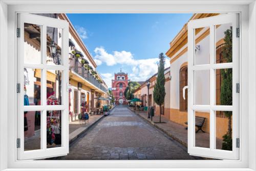 Fototapeta Naklejka Na Ścianę Okno 3D - Pedestrian street and Del Carmen Arch Tower (Arco Torre del Carmen) - San Cristobal de las Casas, Chiapas, Mexico