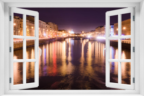 Fototapeta Naklejka Na Ścianę Okno 3D - View of Lomonosov bridge across the Fontanka river, Saint-Petersburg, at night anover side