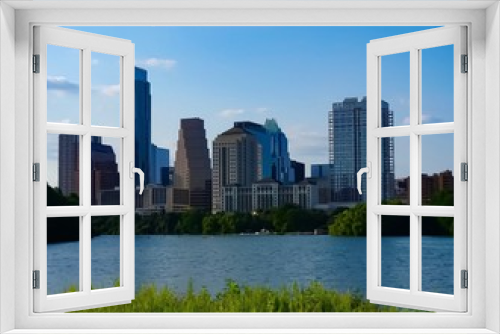 Fototapeta Naklejka Na Ścianę Okno 3D - A skyline view of downtown Austin Texas from the boardwalk on Lady Bird Lake