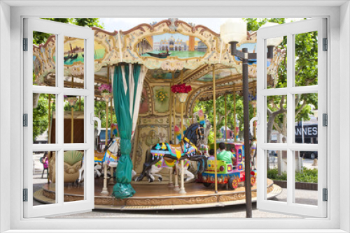 Fototapeta Naklejka Na Ścianę Okno 3D - Colorful Merry Go Round in France