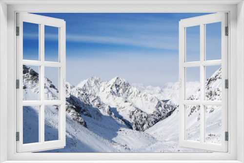Fototapeta Naklejka Na Ścianę Okno 3D - Clear blue sky in winter mountains above the peaks