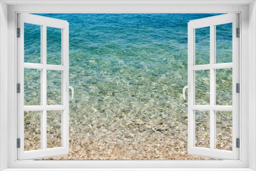 Fototapeta Naklejka Na Ścianę Okno 3D - square background image of calm turquoise sea on shingle beach
