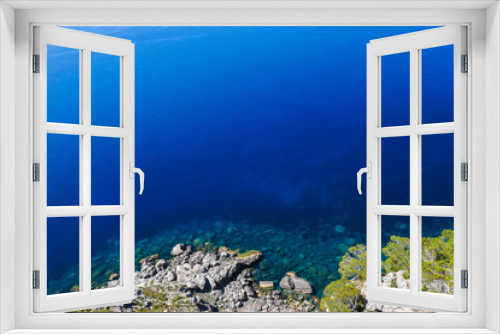 Fototapeta Naklejka Na Ścianę Okno 3D - Beautiful travel landscape of Mallorca island of Spain on a sunny day a blue sky and azure sea near stony rocks