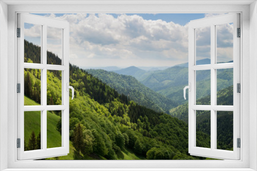 Fototapeta Naklejka Na Ścianę Okno 3D - Cloudy view over a mountain valley
