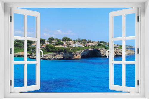 Fototapeta Naklejka Na Ścianę Okno 3D - Landscape of the beautiful bay of Cala Mandia with a wonderful turquoise sea, Porto Cristo, Majorca, Spain 