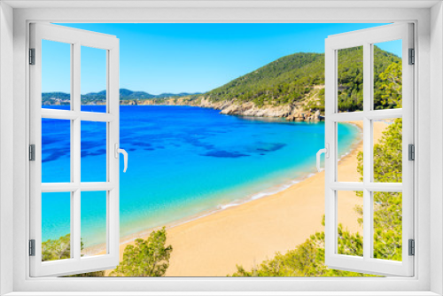 Fototapeta Naklejka Na Ścianę Okno 3D - Amazing beach view with azure sea water in Cala San Vicente bay in northern part of Ibiza island, Spain
