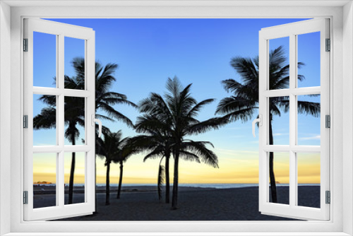 Fototapeta Naklejka Na Ścianę Okno 3D - Sunset at Ipanema beach with coconuts trees in Rio de Janeiro