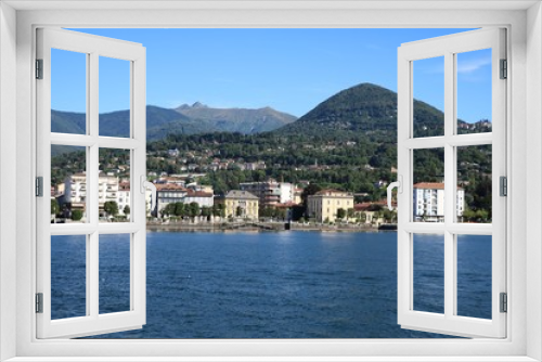 Fototapeta Naklejka Na Ścianę Okno 3D - Holidays at Lake Maggiore in summer, view to Intra Verbania from the car ferry, Italy