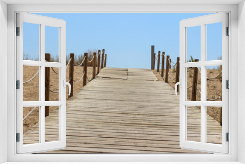 Fototapeta Naklejka Na Ścianę Okno 3D - Camino de madera en la playa