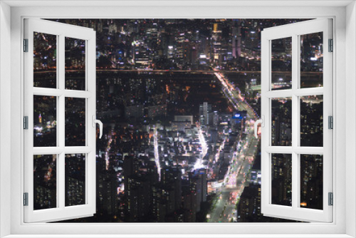 Fototapeta Naklejka Na Ścianę Okno 3D - Night view of the crossroad from skyscraper in Seoul