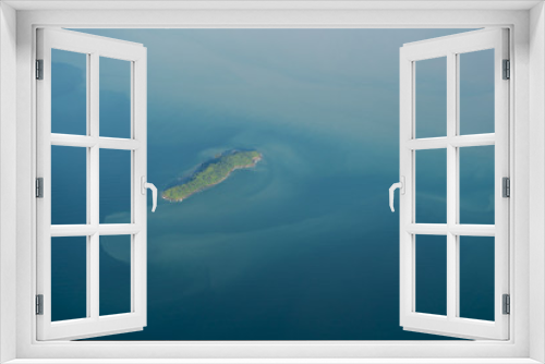 Fototapeta Naklejka Na Ścianę Okno 3D - Aerial view of a tropical island