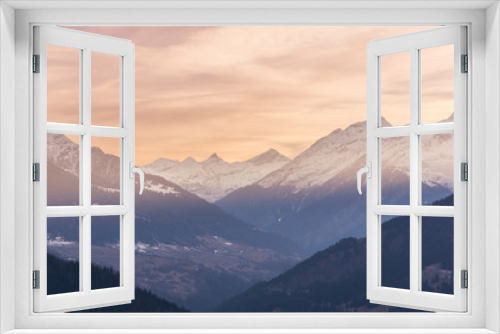 Fototapeta Naklejka Na Ścianę Okno 3D - Sunset over snowy Swiss mountains
