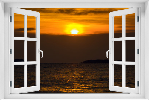 Fototapeta Naklejka Na Ścianę Okno 3D - sunset time over the golden sky and sea or ocean water.