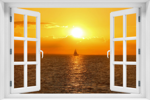Fototapeta Naklejka Na Ścianę Okno 3D - Segeln im Sonnenuntergang