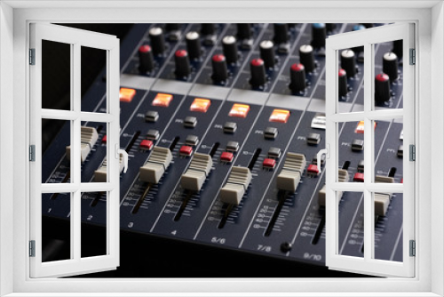 Professional Music Mixer Console with dial knob and slide bar. Professional music recording equipment.