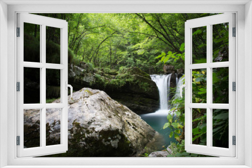 Fototapeta Naklejka Na Ścianę Okno 3D - a view of a waterfall
