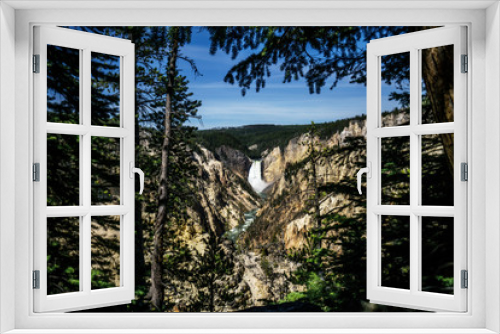 Fototapeta Naklejka Na Ścianę Okno 3D - Waterfall in the Canyon through the Trees
