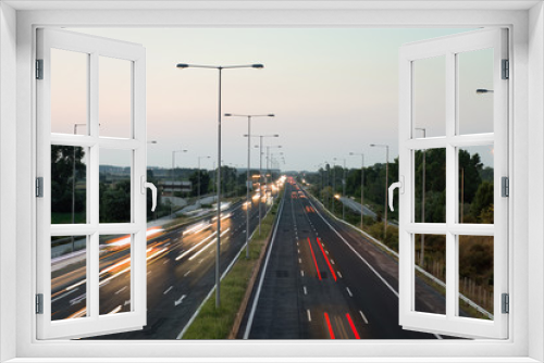 Fototapeta Naklejka Na Ścianę Okno 3D - Car traffic lights at evening on a highway