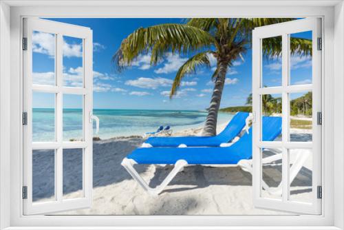 Fototapeta Naklejka Na Ścianę Okno 3D - Beach vacation background scenic landscape at the sea with palm trees and blue teal water