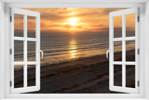 Fototapeta Naklejka Na Ścianę Okno 3D - Meer mit Sonnenuntergang und Wolken