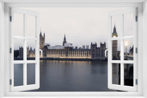 Fototapeta Naklejka Na Ścianę Okno 3D - A view of the Palace of Westminster and Big Ben from across the River Thames.