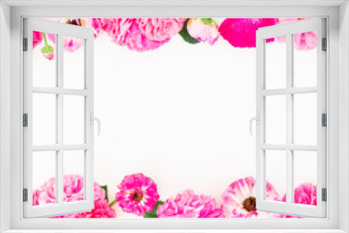 Fototapeta Naklejka Na Ścianę Okno 3D - Floral wreath frame of roses, pink flowers and leaves isolated on white background. Flat lay, top view.