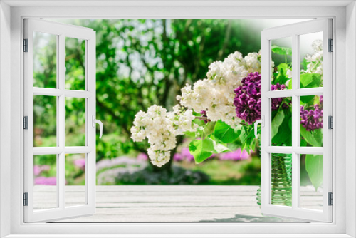 Fototapeta Naklejka Na Ścianę Okno 3D - lilac flowers on wooden table im garden. copy space. good morning