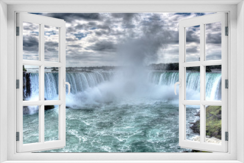 Fototapeta Naklejka Na Ścianę Okno 3D - Niagara Falls Horeshoe falls with artistic editing to create a surreal effects.