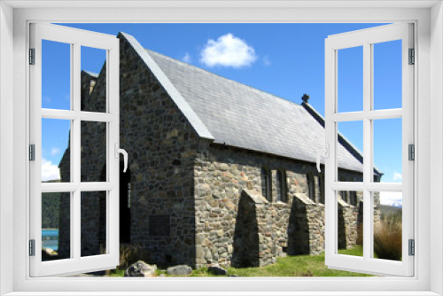 Fototapeta Naklejka Na Ścianę Okno 3D - Old Stone Church under a Blue Sky