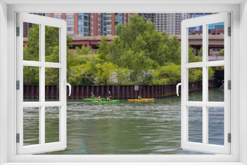 Fototapeta Naklejka Na Ścianę Okno 3D - Kajak Fahrer paddeln auf Chicago River