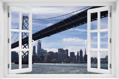 Fototapeta Naklejka Na Ścianę Okno 3D - ベイブリッジとサンフランシスコの街並み