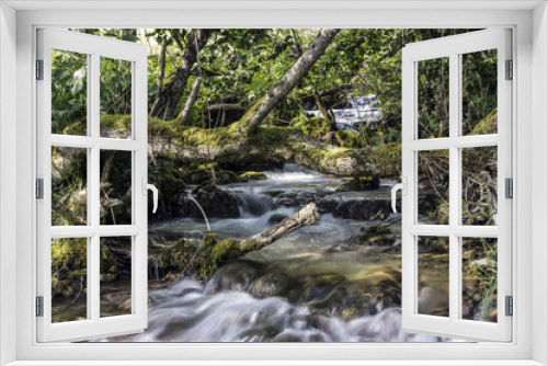 Fototapeta Naklejka Na Ścianę Okno 3D - Waterfalls in a mountain stream