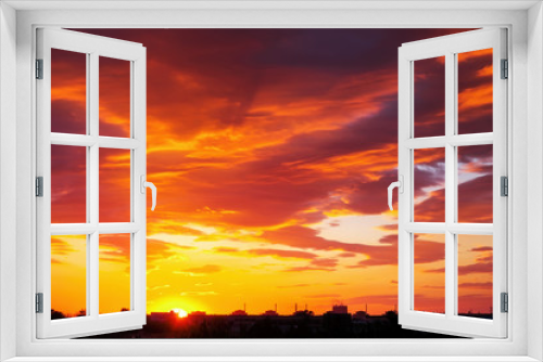 Fototapeta Naklejka Na Ścianę Okno 3D - Beautiful fiery orange and red sunset sky.