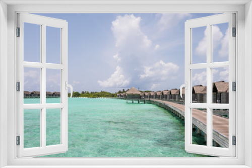 Fototapeta Naklejka Na Ścianę Okno 3D - View of a tropical resort at day time.