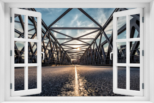 Fototapeta Naklejka Na Ścianę Okno 3D - Sunset over steel bridge in the Hamburg Hafencity