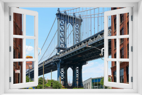 Fototapeta Naklejka Na Ścianę Okno 3D - Pillar of Manhattan Bridge as seen from Dumbo district in Brooklyn
