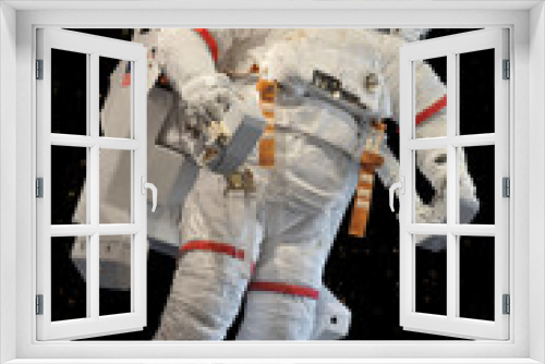 Fototapeta Naklejka Na Ścianę Okno 3D - Astronaut's space suit (Elements of this image furnished by NASA)