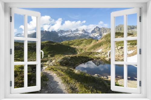 Fototapeta Naklejka Na Ścianę Okno 3D - Schweizer Alpen Landschaft beim Sustenpass - Wanderweg durch Hügel und kleine Bergseen in den schweizer Bergenlandschaft
