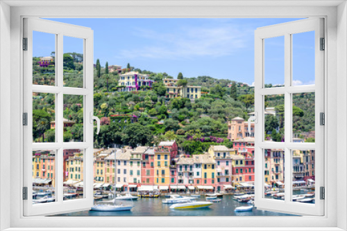 Fototapeta Naklejka Na Ścianę Okno 3D - Beautiful aerial daylight view from top to ships on water and buildings in Portofino city of Italy. Tourists walking on sidewalk. Top view