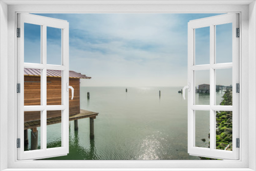 Fototapeta Naklejka Na Ścianę Okno 3D - Delta Po - Casette da pesca