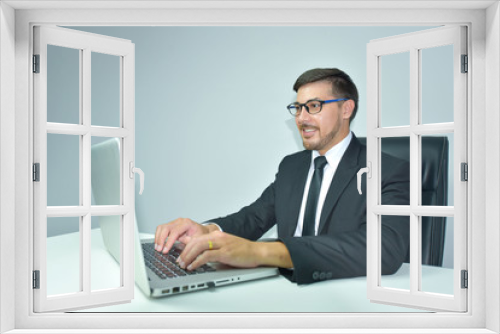 business man working with laptop. Isolated over white background