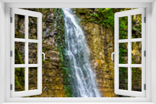 Fototapeta Naklejka Na Ścianę Okno 3D - Photo of high waterfall in Carpathian mountains