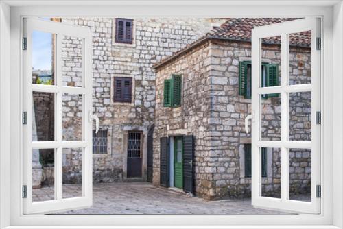 Fototapeta Naklejka Na Ścianę Okno 3D - Old Stone Houses on Square in Ancient Town Stari Grad in Croatian Island Hvar