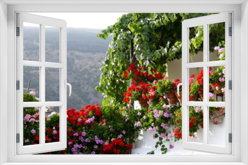 Fototapeta Naklejka Na Ścianę Okno 3D - Blumenpracht  in Capileira, Andalusien