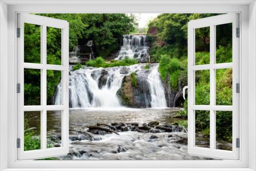 Fototapeta Naklejka Na Ścianę Okno 3D - Cascaded waterfall in a green forest. Dzhurinsky waterfall Ukraine.