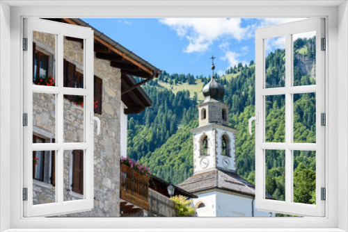 Typical Houses and churches of the mountain village of Sauris